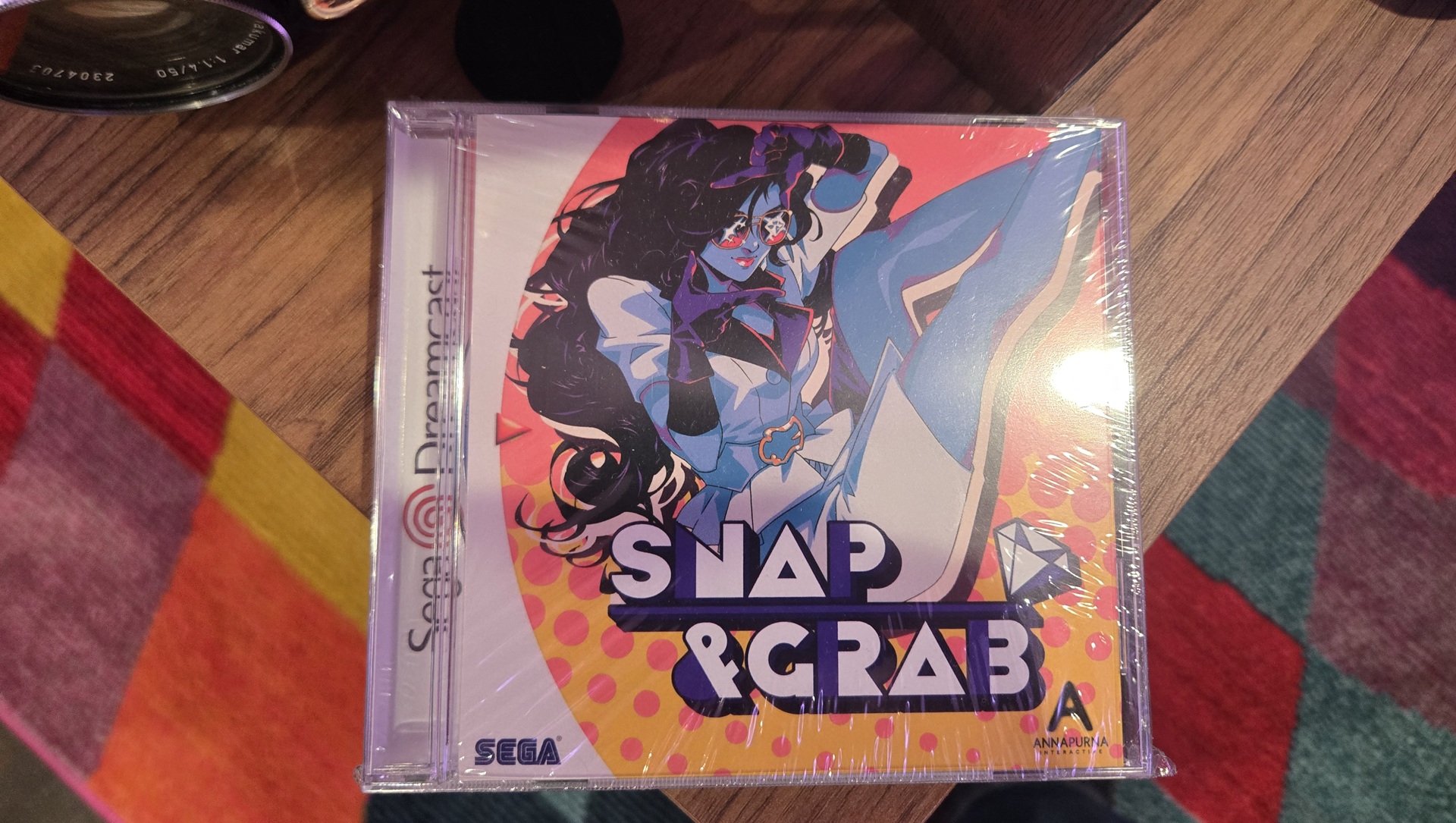 Кейс для Snap & Grab, стилизованный под Sega Dreamcast