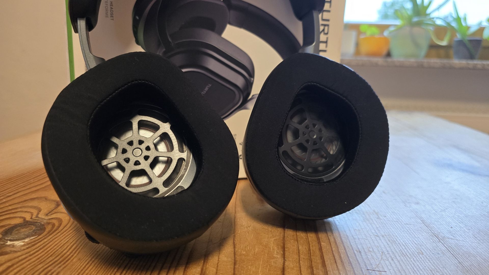 The Turtle Beach Stealth 700 (Gen 3) next to to its package box