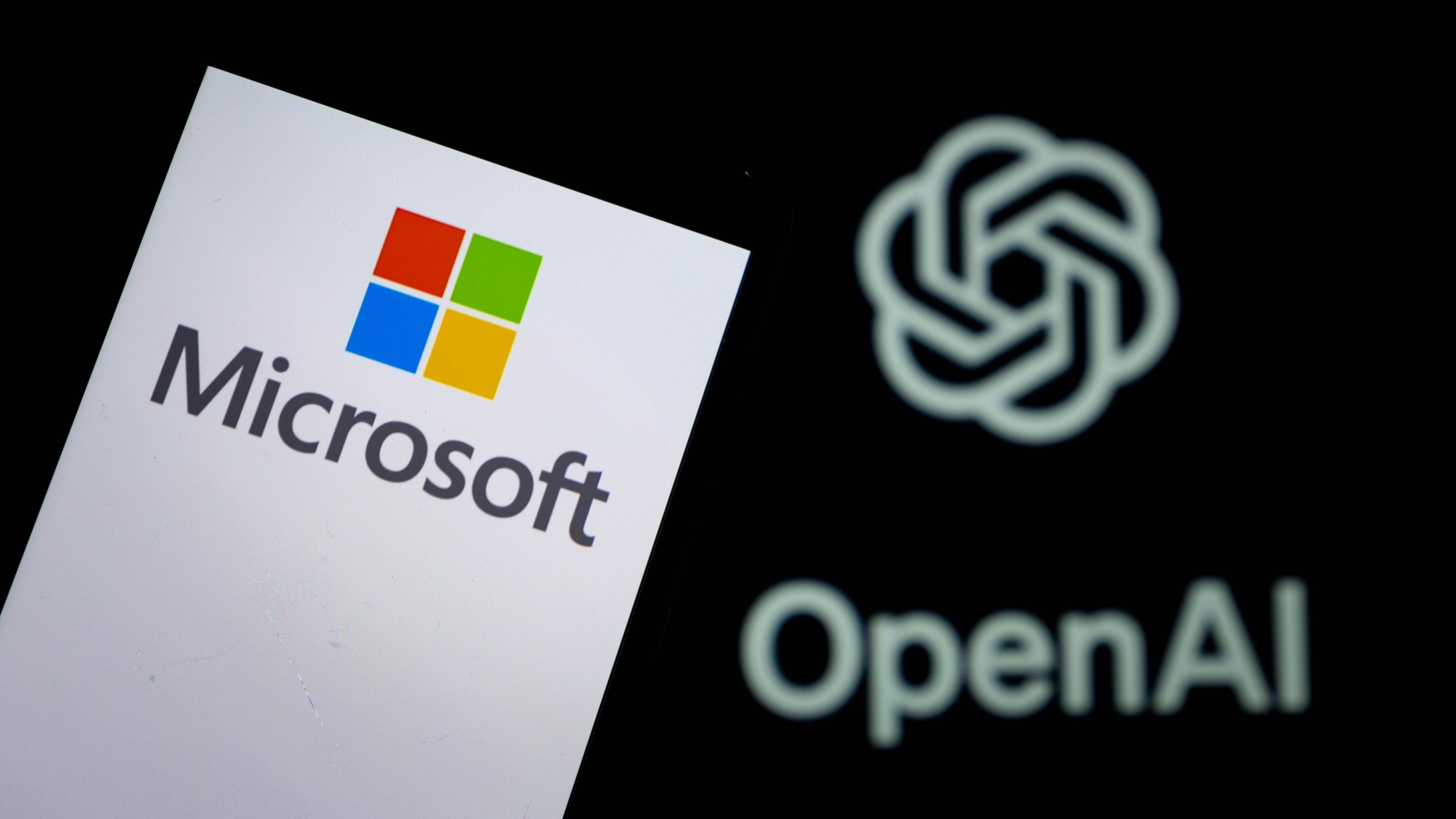 Microsoft and OpenAI logos