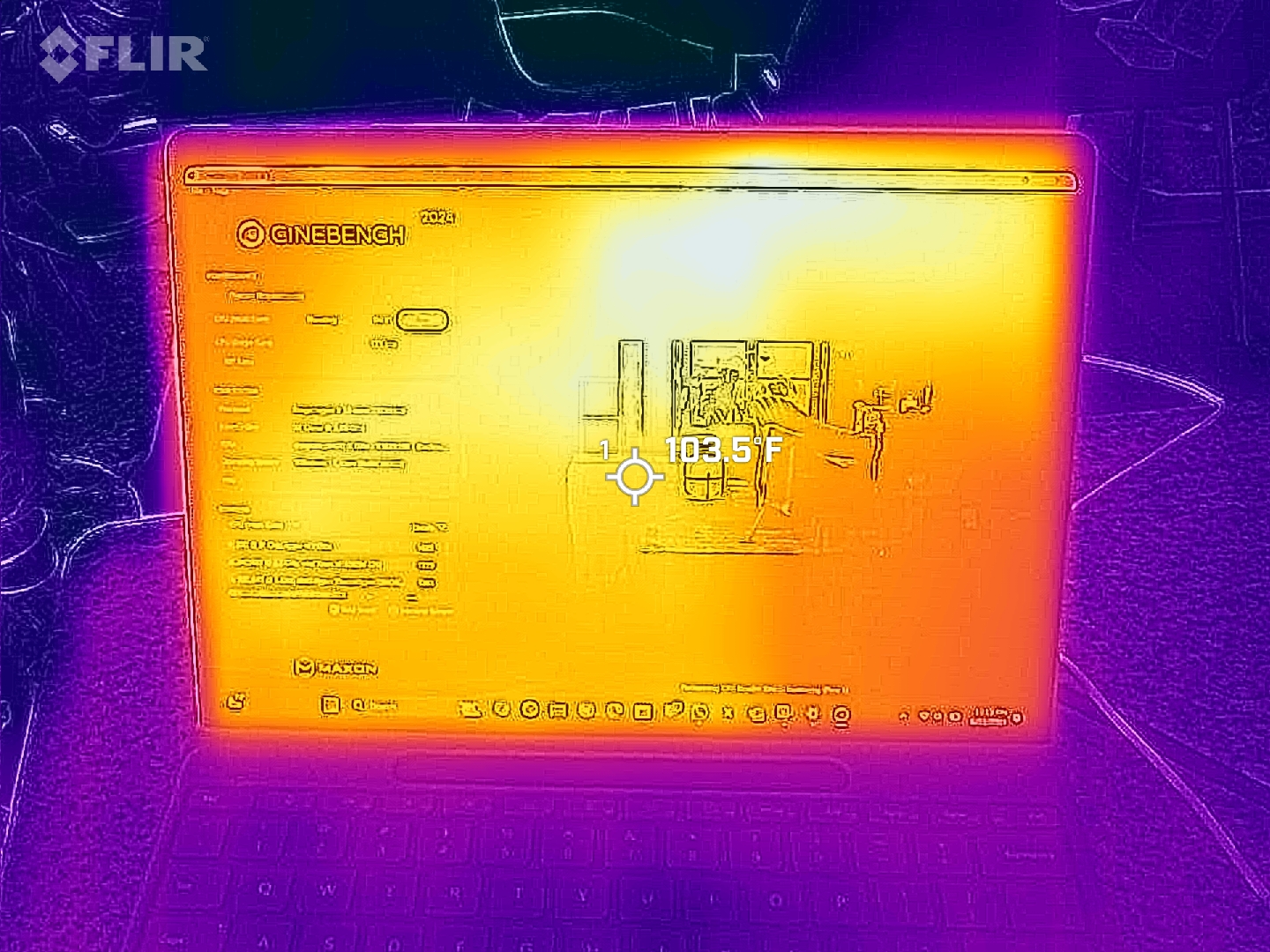 Thermal image of a Surface Pro 11 laptop displaying a Cinebench test. The screen shows a hot area in bright yellow, indicating high temperature at 103.5°F.