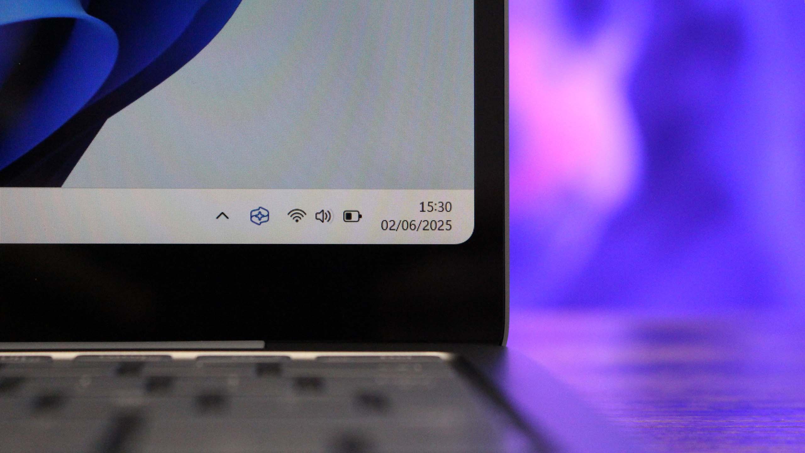 A look at the Windows 11 taskbar running on the Surface Laptop 13-inch.