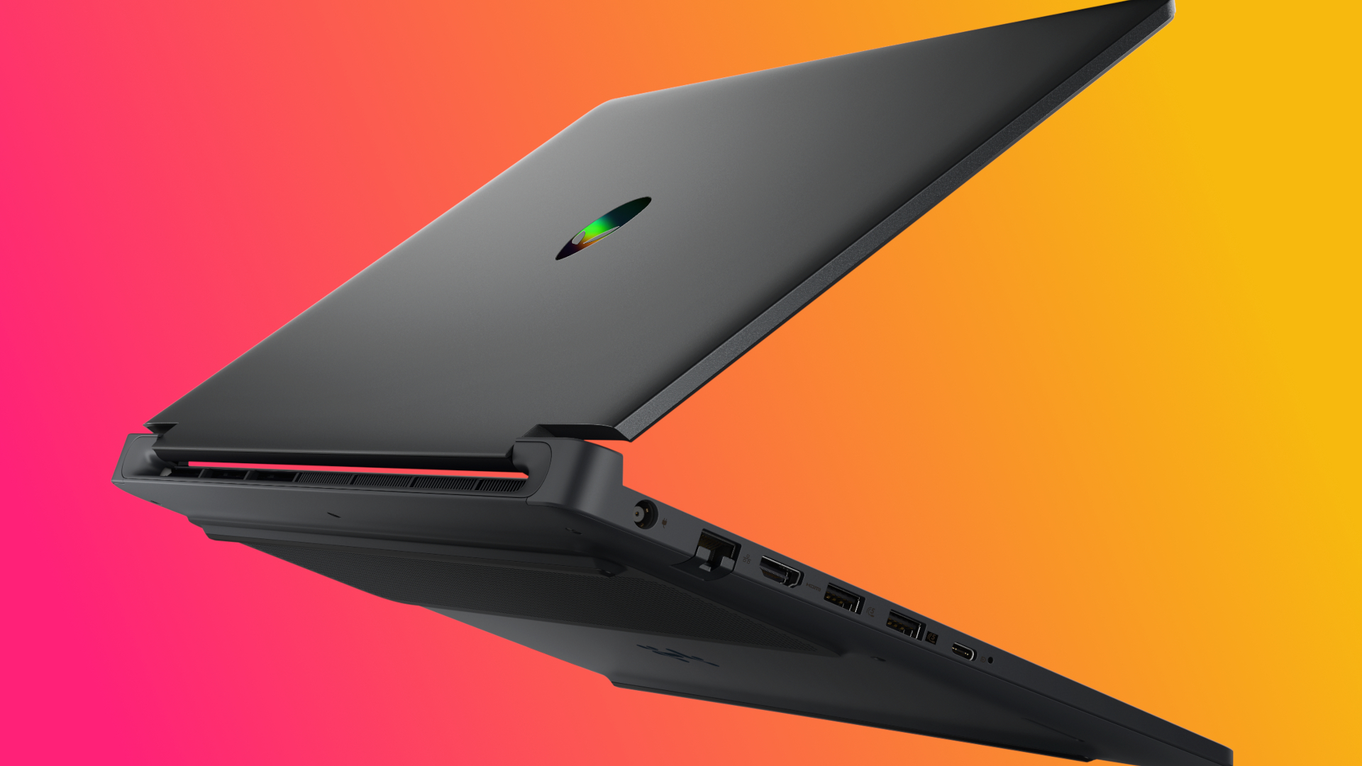 An angled view of the rear corner of the Alienware 15, with left ports and hinge in view.