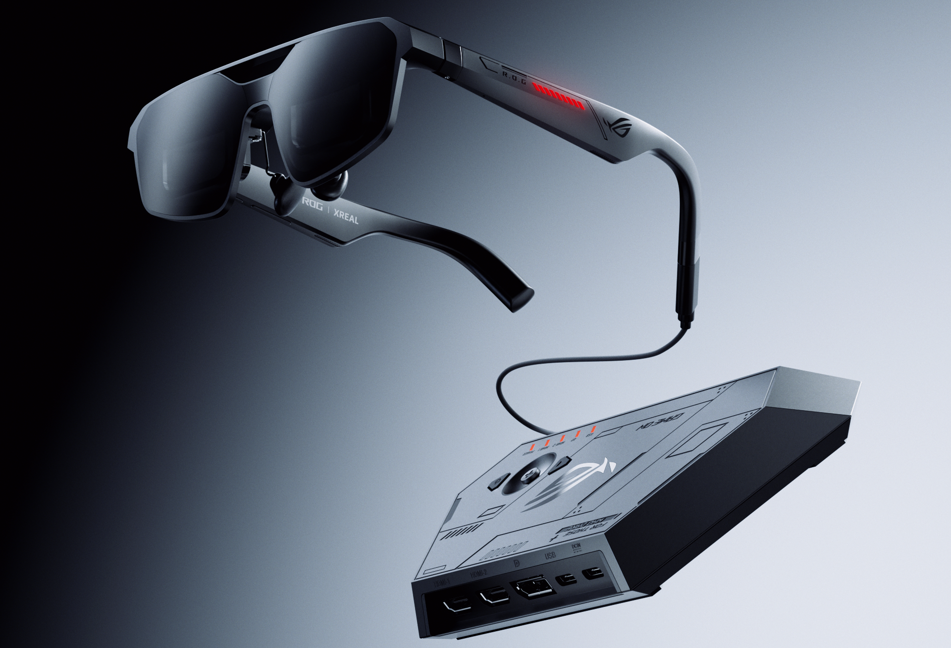 Futuristic AR headset with sleek black glasses connected to a tech box, featuring red accents. The design is modern, evoking innovation and cutting-edge technology.